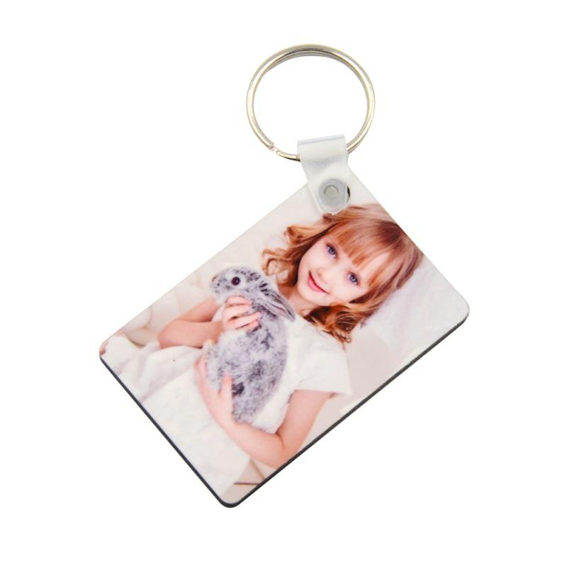 Sublimation blank rectangular keyring with printed photo, ideal for custom laser engraving