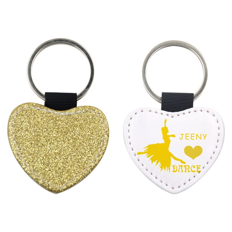 Heart-shaped sublimation keyrings, glitter gold and personalized white with dance design