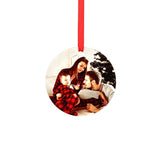 Blank round sublimation ornament with red ribbon, featuring a printed family Christmas photo.