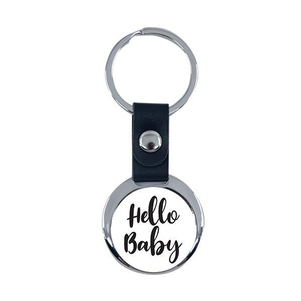 Round metal and black leather keyring with 'Hello Baby' text, suitable for sublimation or engraving.