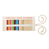 Blank canvas pencil case for sublimation, open with colored pencils and plain wood pencils inside