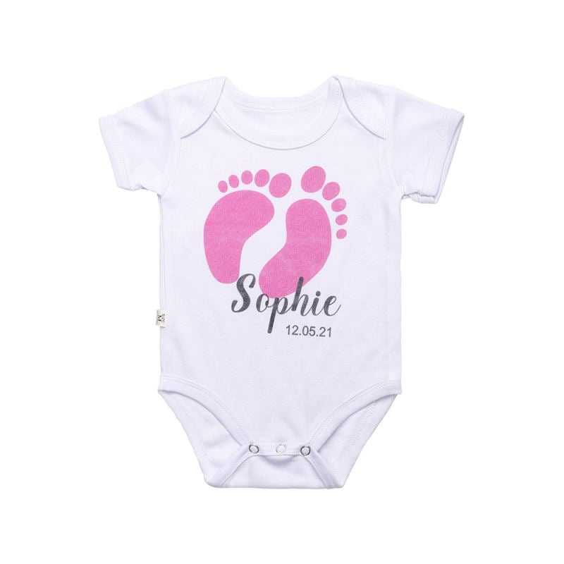 White baby bodysuit for sublimation with pink footprints and custom name and date print
