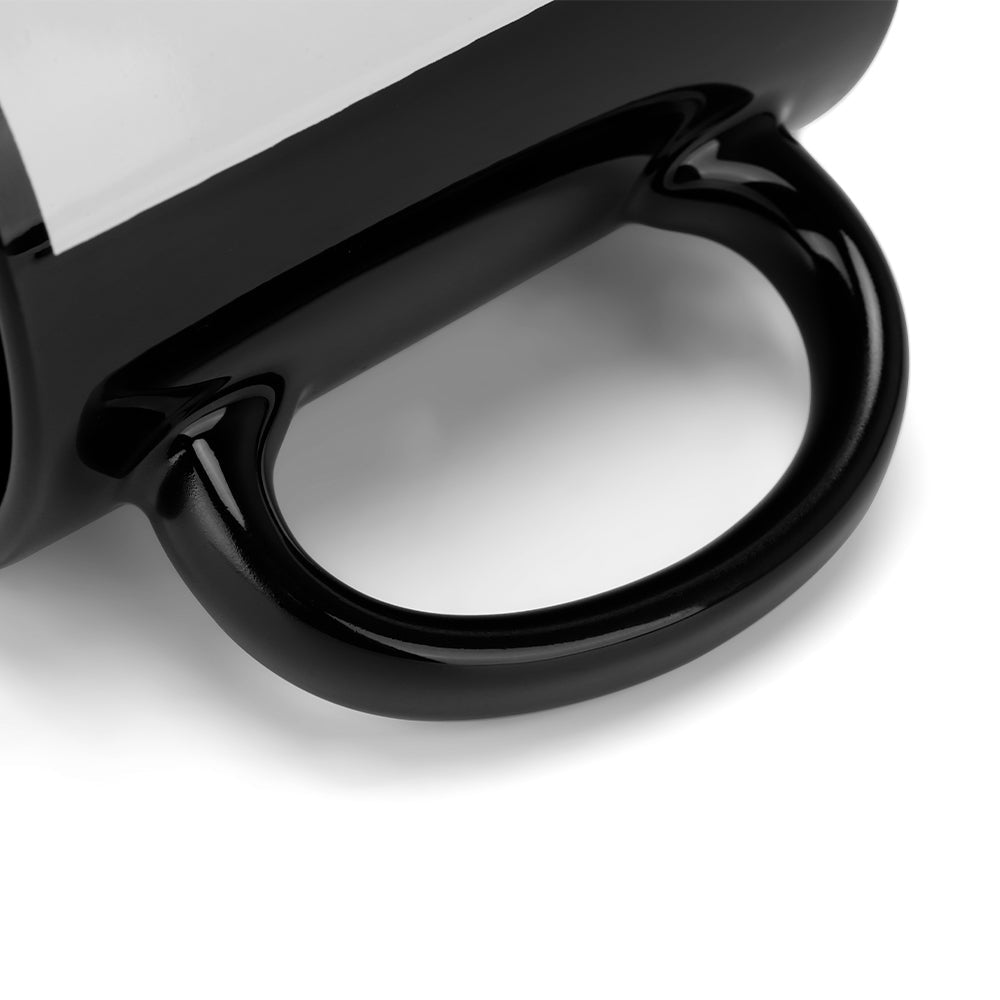 Close-up of black ceramic mug handle for sublimation and laser engraving blanks