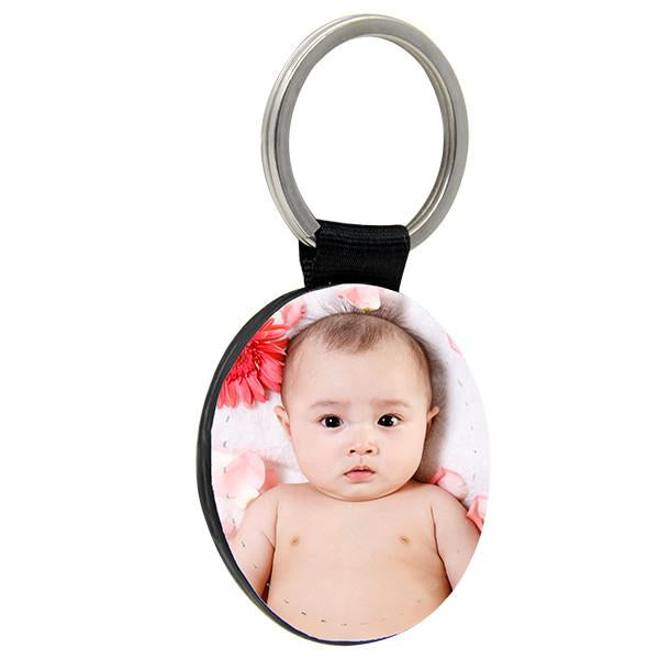Sublimation blank keyring with custom baby photo insert, ideal for laser engraving.