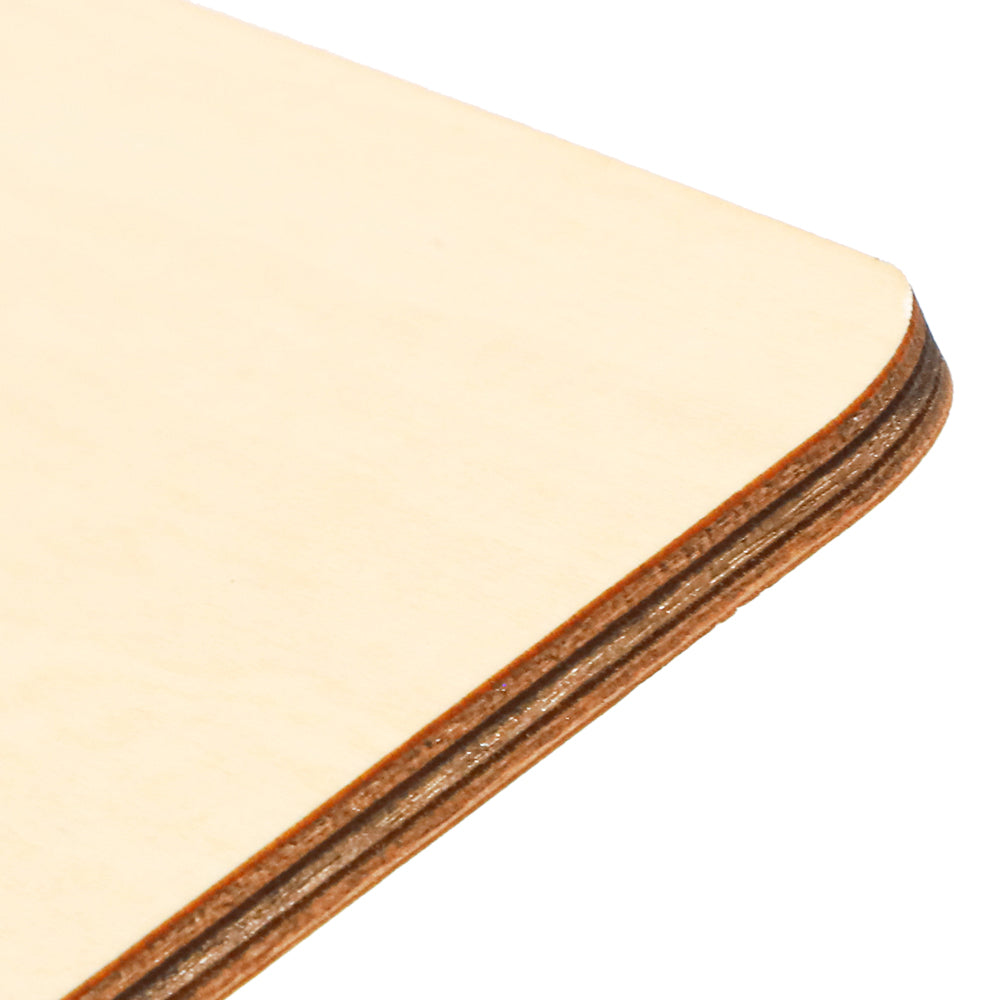 Close-up of blank plywood sheet with rounded edge for sublimation and laser engraving projects