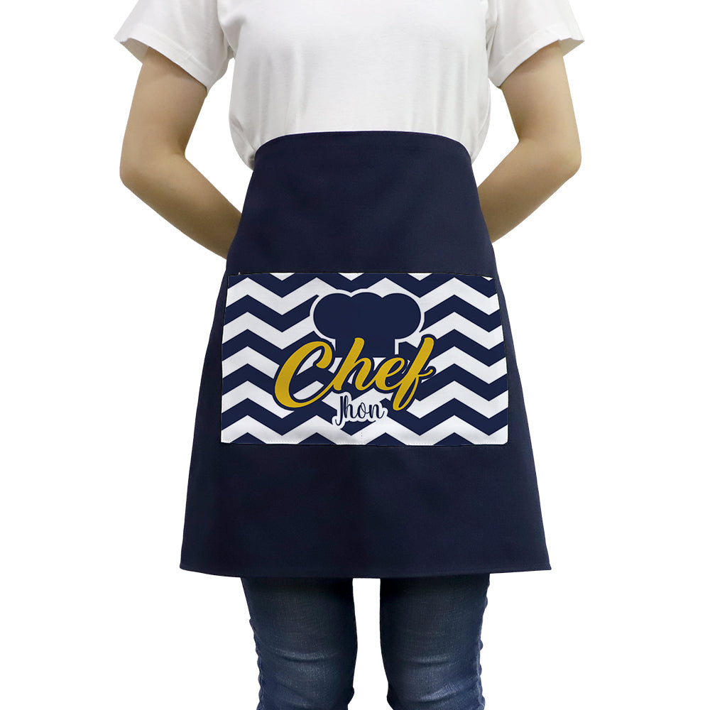 Adult blue waist apron with front pocket, zigzag pattern, and chef hat sublimation print