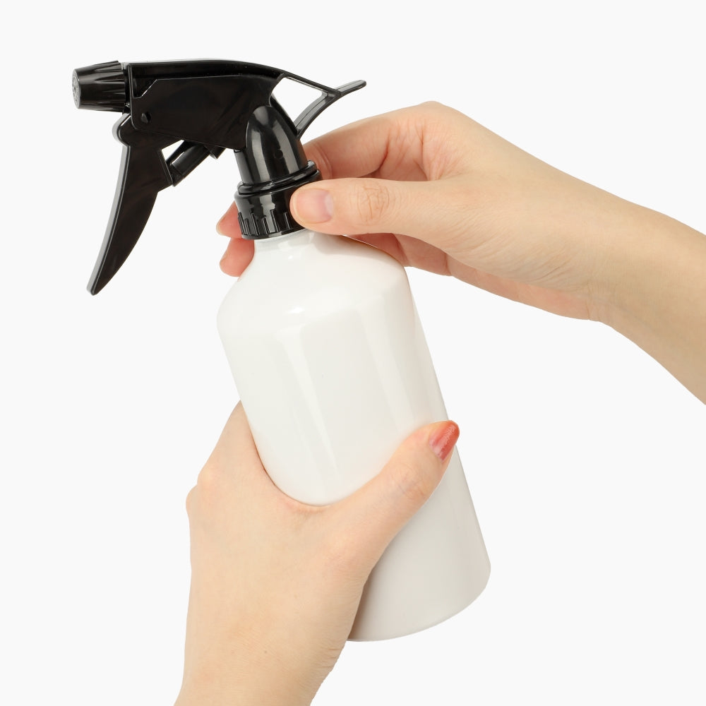 Blank white aluminium spray bottle held in hand, ideal for sublimation and laser engraving