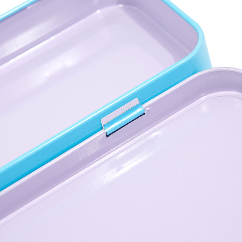 Open blue metal tin for sublimation or laser engraving, close-up of corner and lid latch