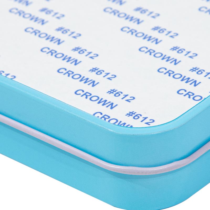 Close-up of a blue metal sublimation blank tin, suitable for laser engraving and personalization.