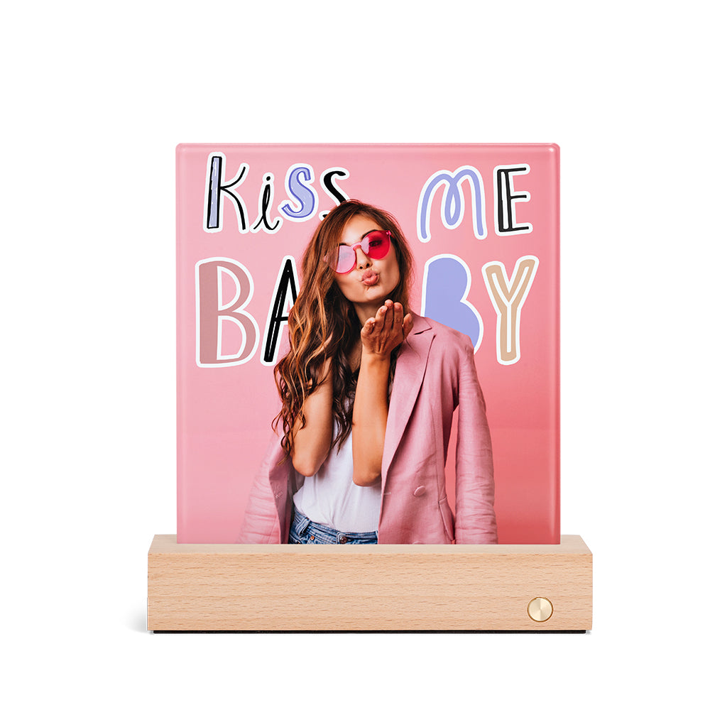 Glass Photo panel with LED Base featuring a sublimated image of a woman in pink with 'Kiss Me Baby' text, ideal for personalized home decor.