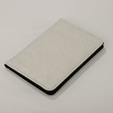 Sublimation Blank Poly PU Passport Cover - White with elegant texture, ideal for custom printing and waterproof travel use.