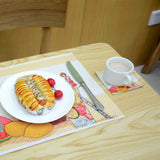 Linen sublimation coaster with colorful print under white coffee cup on dining table