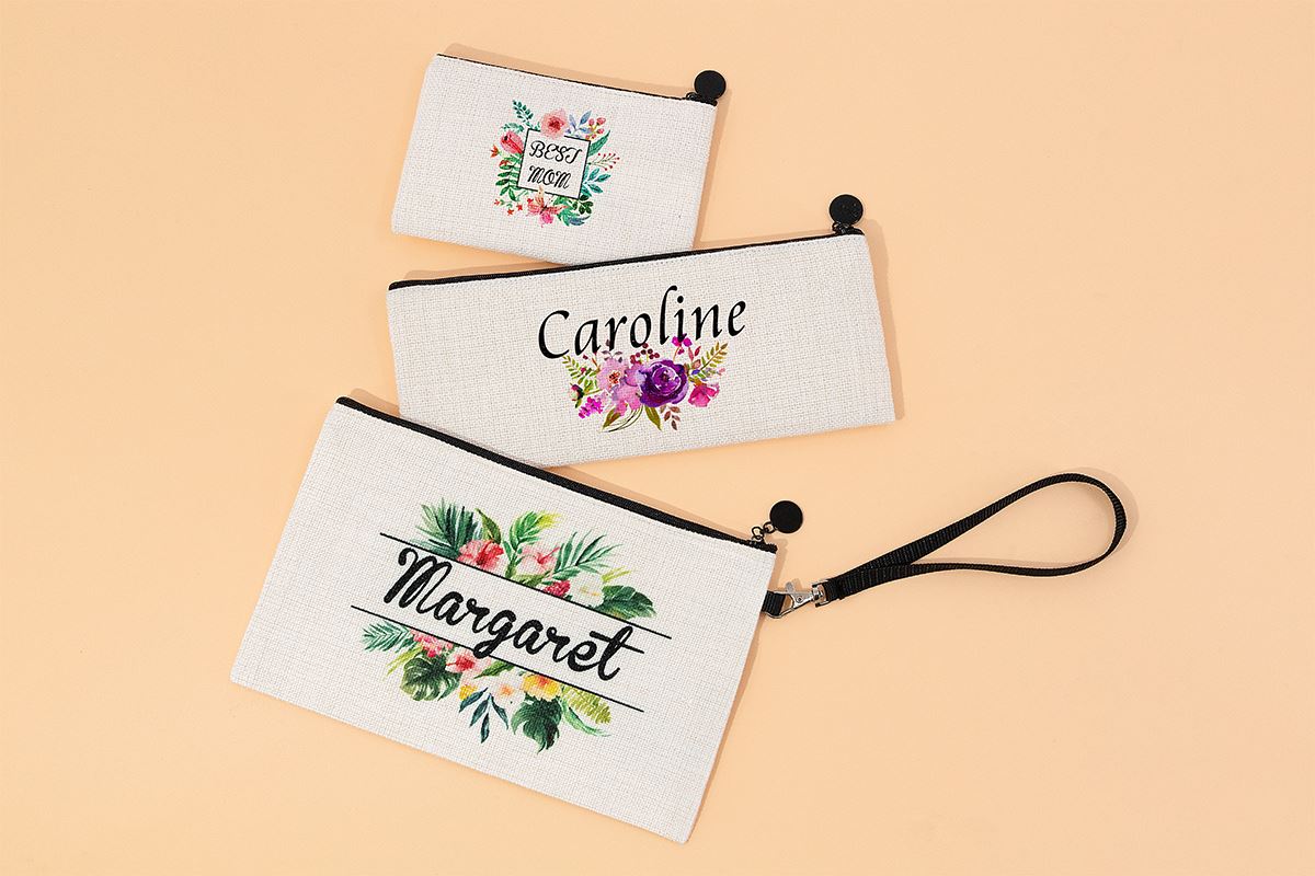 Set of three linen cosmetic pouches with floral sublimation designs and personalized names