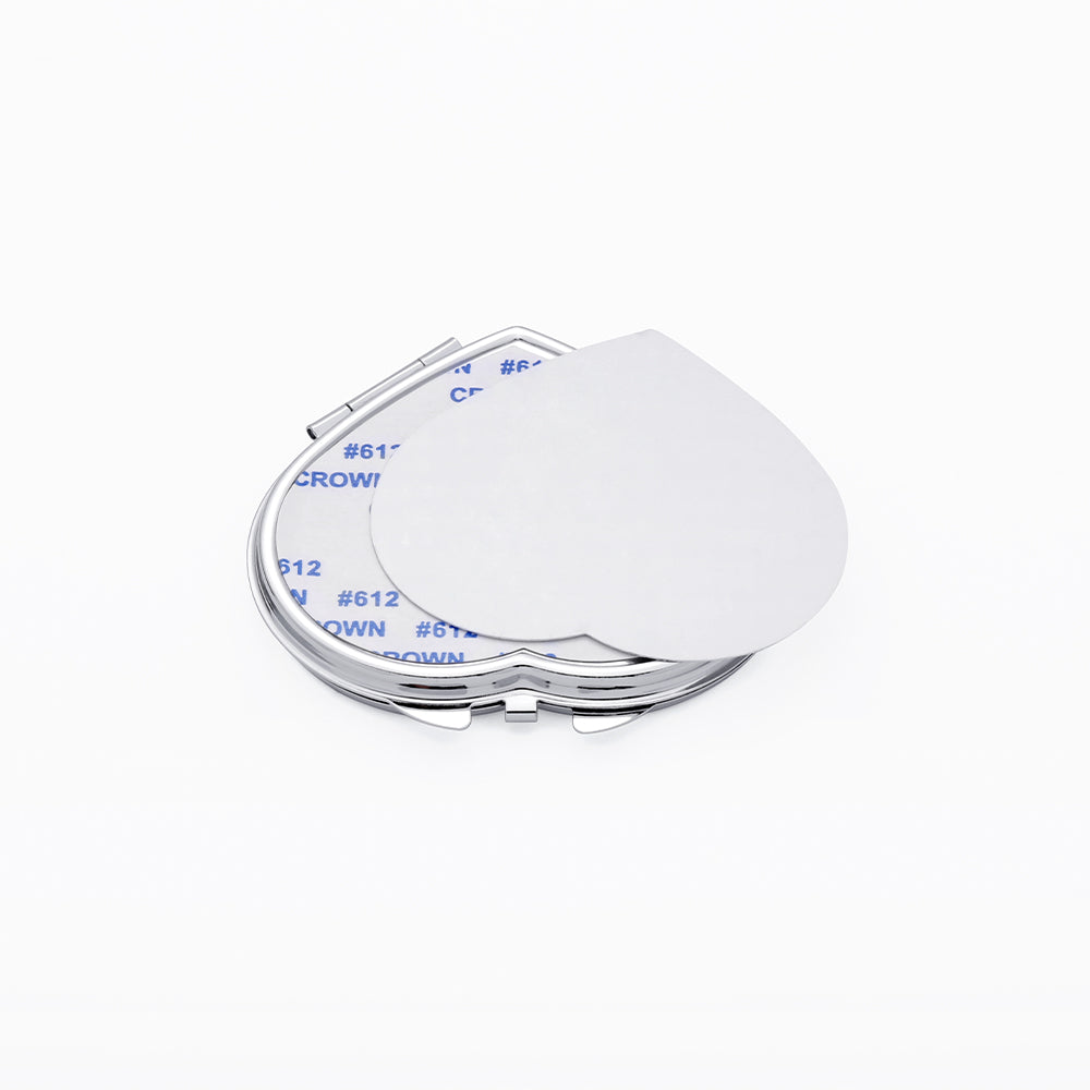 Blank heart-shaped pocket mirror for sublimation and laser engraving on white background