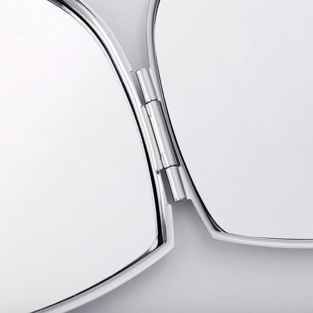 Close-up of open heart-shaped sublimation pocket mirror with metallic hinge, blank for engraving or printing