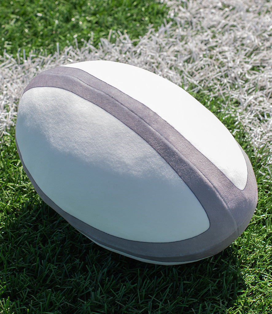 Mumbles Zippie rugby ball on green grass, featuring a soft and cuddly design ideal for personalisation.