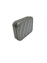 Compact rectangle sublimation metal tin shown upright, designed for custom printing and storing mobile phone accessories or small items.