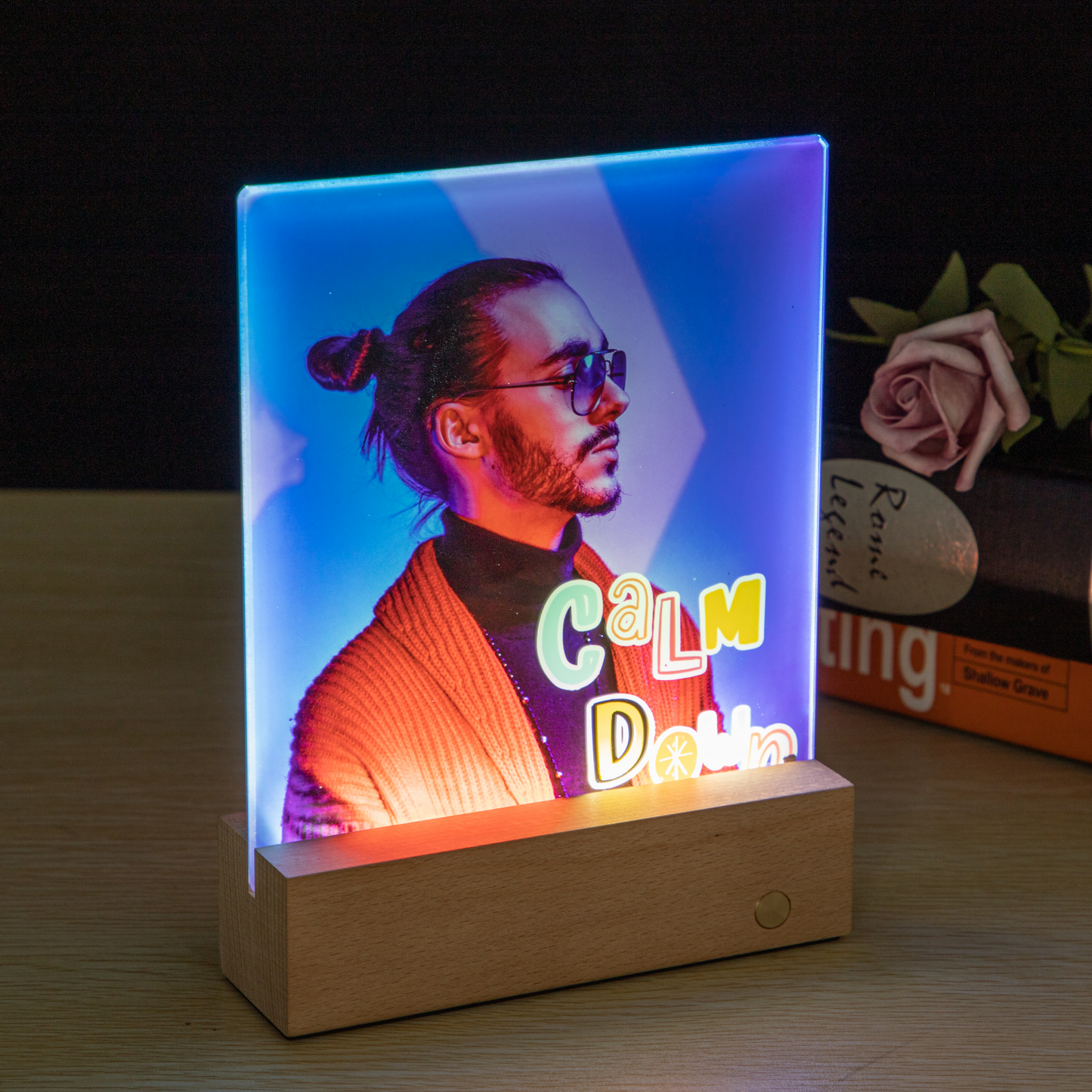 Glass photo panel with LED base displaying a sublimated image of a man in sunglasses and 'Calm Down' text, ideal for custom home decor.