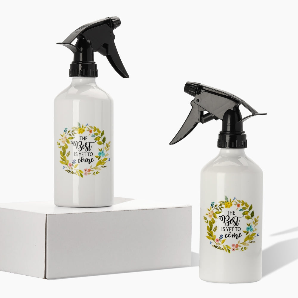 White sublimation aluminum spray bottles with black nozzles and floral wreath design
