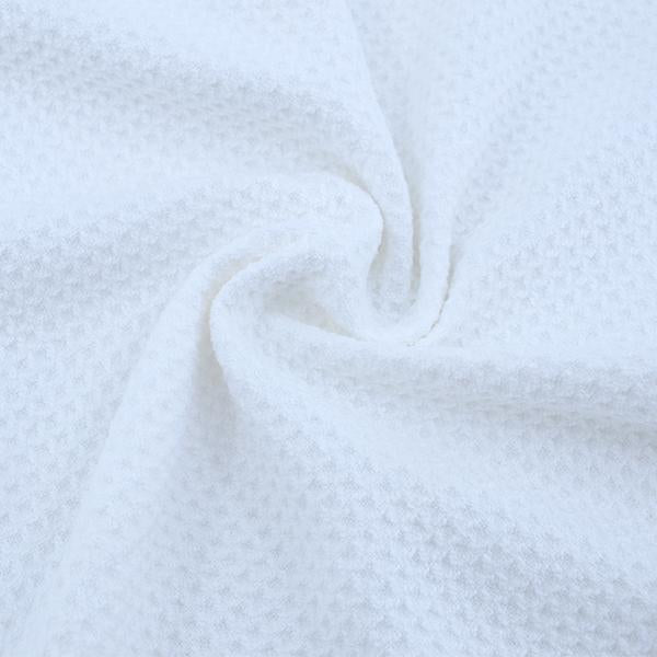 Close-up of blank white cotton towel with waffle texture for sublimation printing