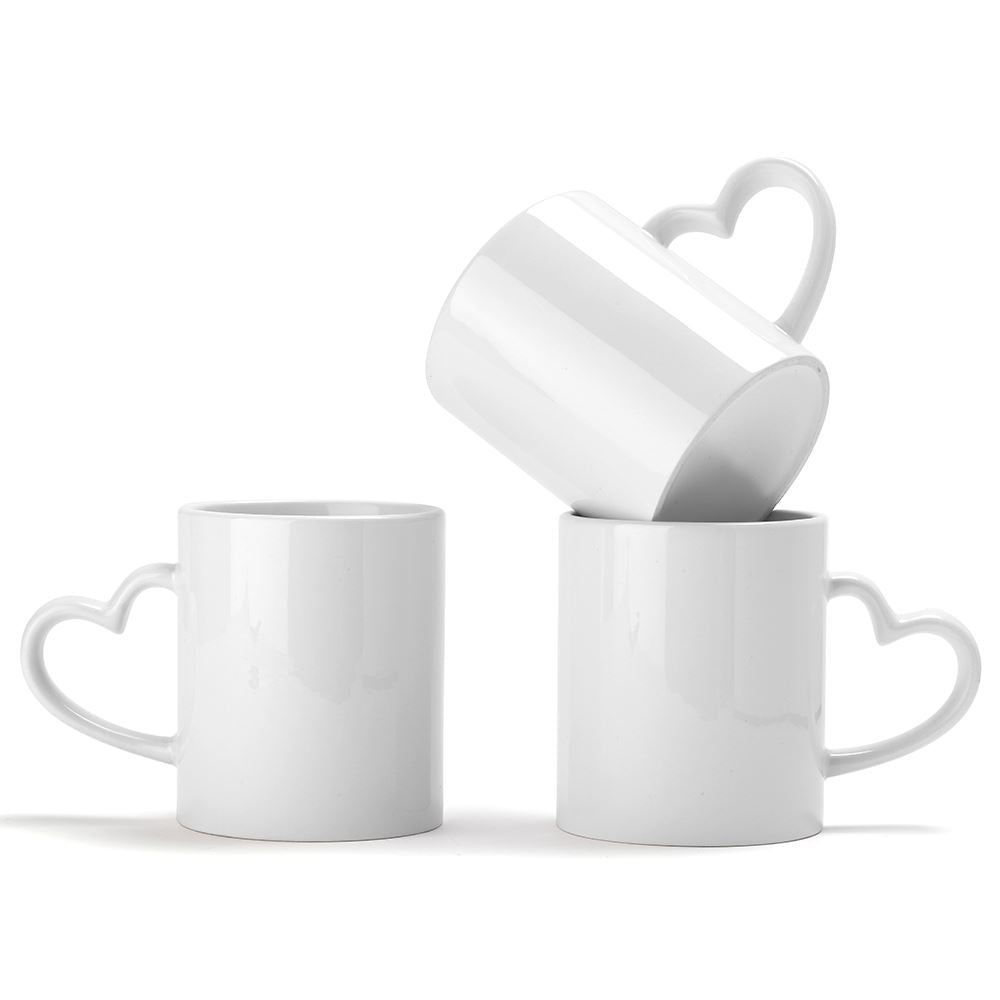 blank white heart handle mugs for sublimation and laser engraving, three arranged together